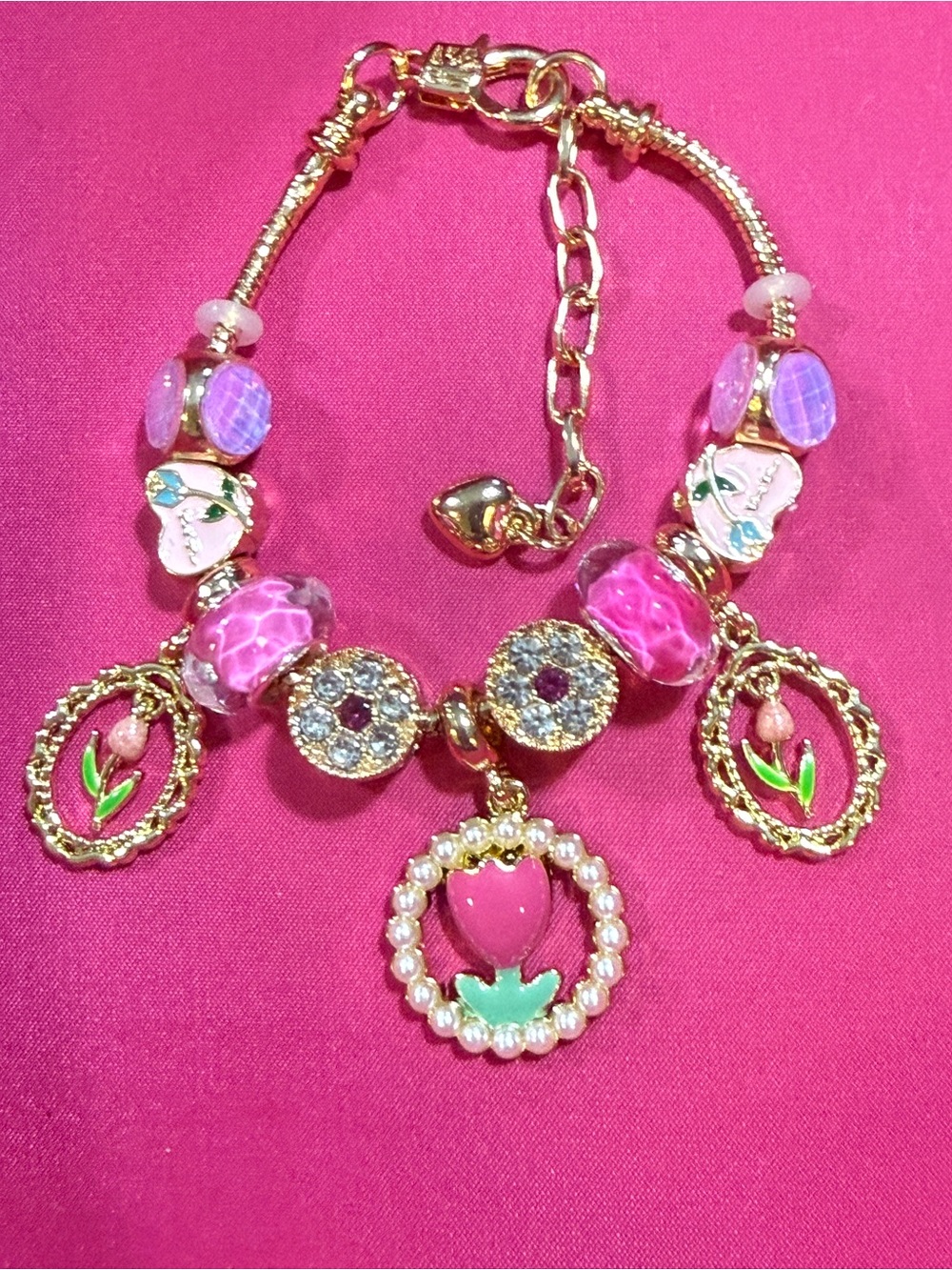 Gold-Tone Pink Charm Bracelet with Enamel Flower Accents